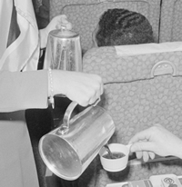 picture of women serving coffee.