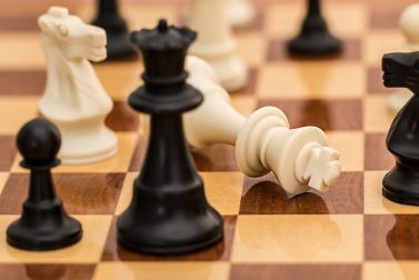 What do playing the stock market and chess have in common?
